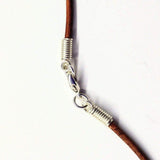 Silver Wrapped Light Amethyst Gemstone Point Leather Necklace from Alexa Martha Designs