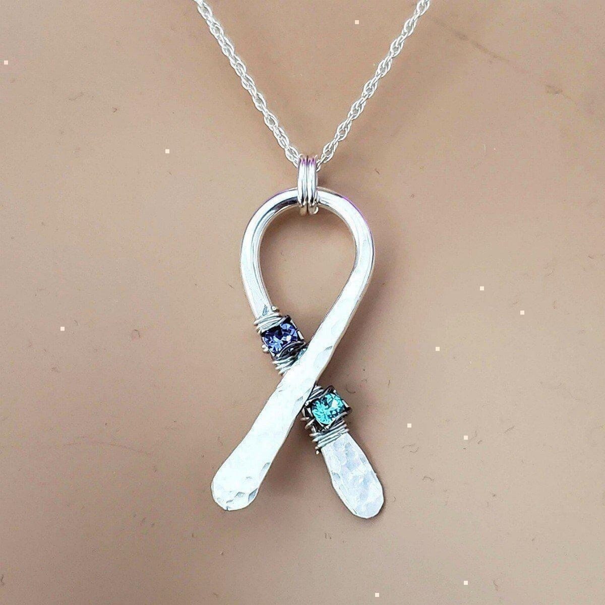 Silver Suicide Prevention Awareness Ribbon Necklace with Purple and Teal Crystals from Alexa Martha Designs