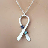 Silver Suicide Prevention Awareness Ribbon Necklace with Purple and Teal Crystals from Alexa Martha Designs