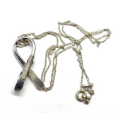 Silver Suicide Prevention Awareness Ribbon Necklace with Purple and Teal Crystals from Alexa Martha Designs