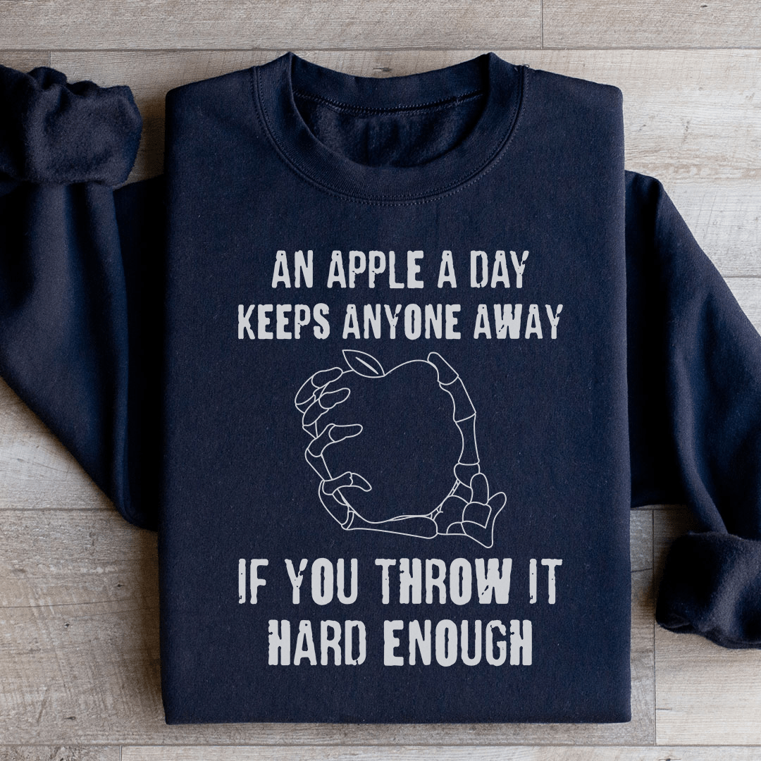 An Apple A Day Keeps Anyone Away If You Throw It Hard Enough Sweatshirt from Peachy Sunday
