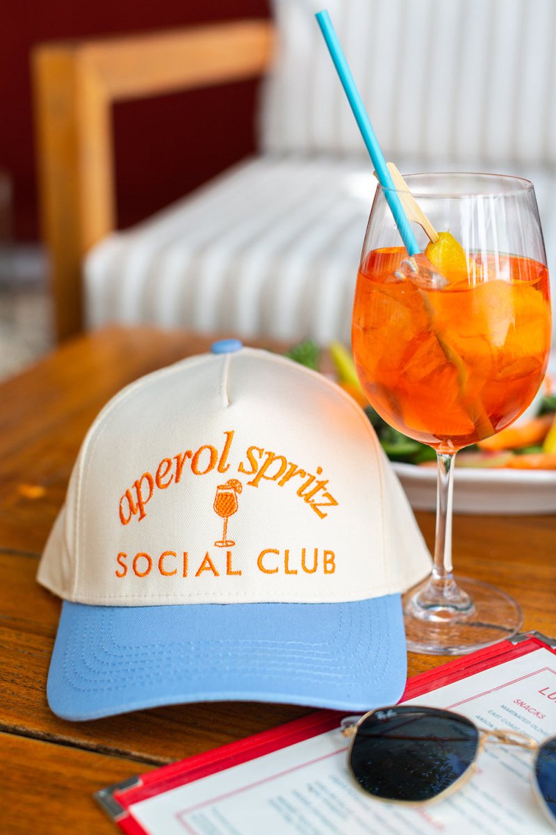 'Aperol Spritz Social Club' Snapback Trucker Hat from United Monograms