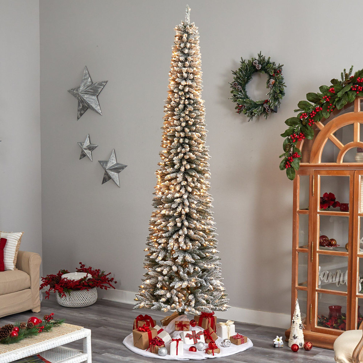 10’ Flocked Pencil Artificial Christmas Tree with 700 Clear Lights and 1145 Bendable Branches from Nearly Natural