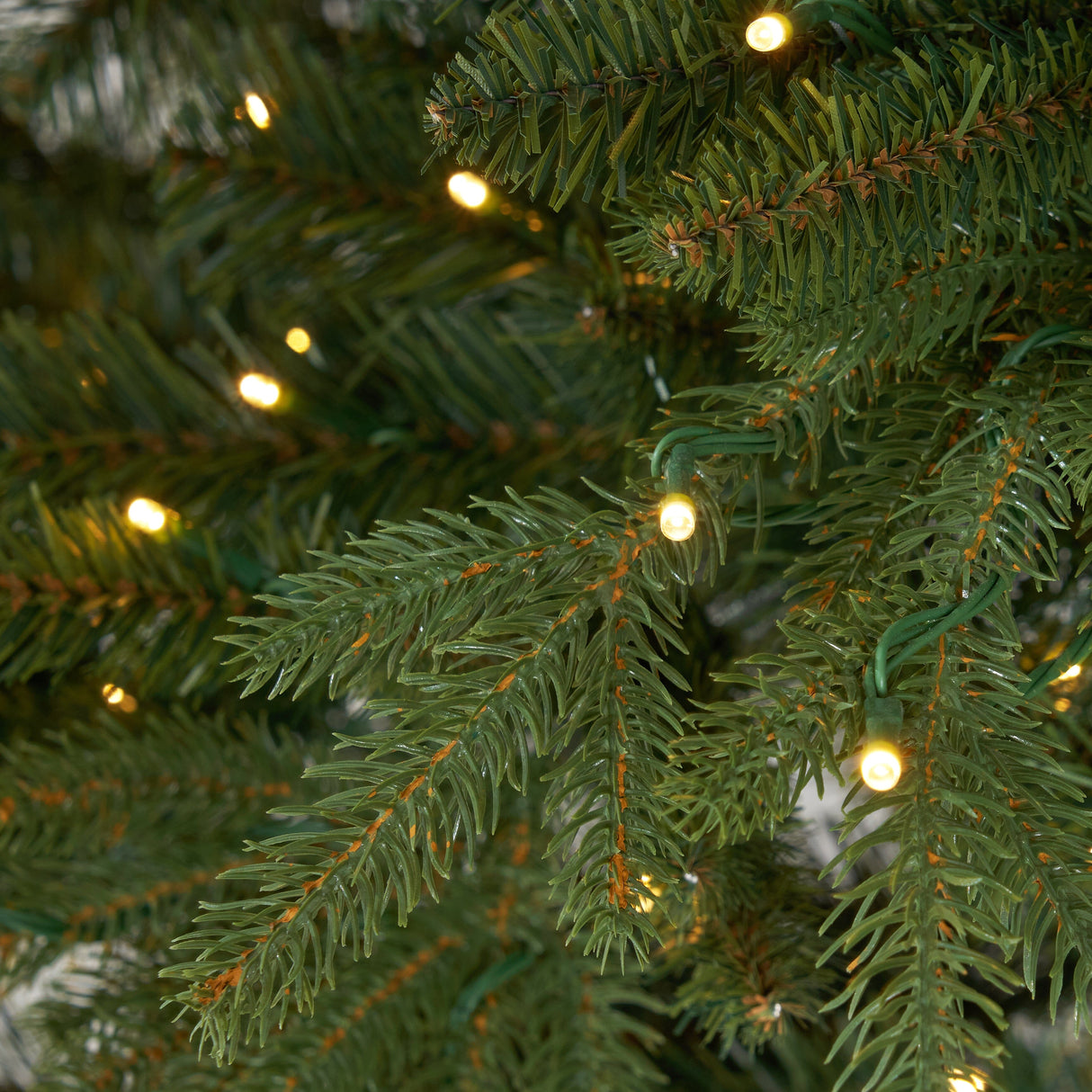 11’ Belgium Fir “Natural Look” Artificial Christmas Tree with 1250 Clear LED Lights and 4222 Bendable Branches from Nearly Natural