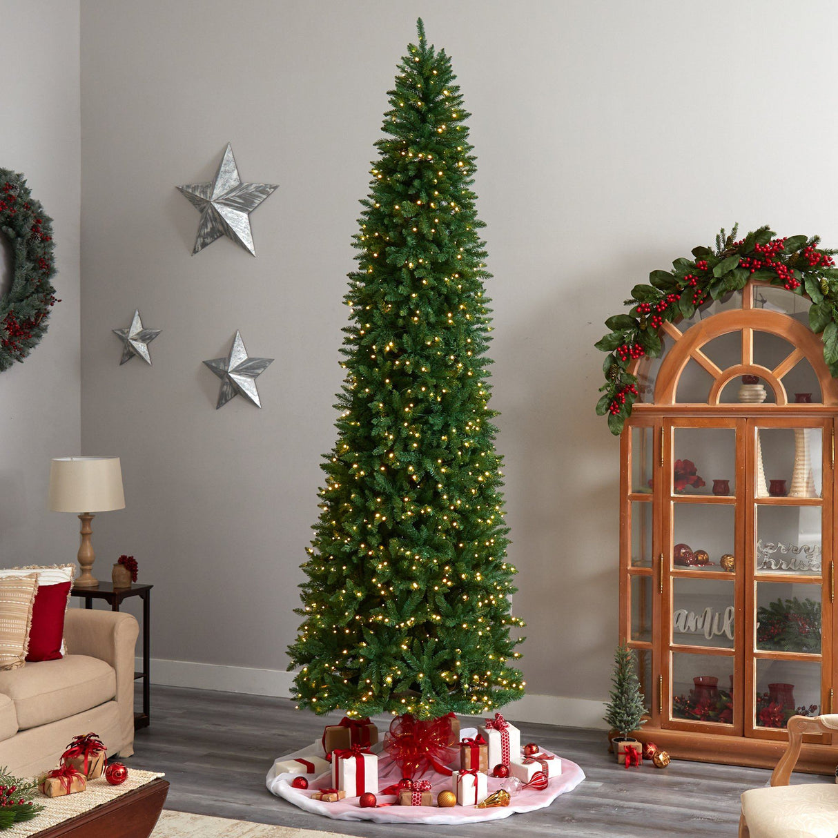 11’ Slim Green Mountain Pine Christmas Tree with 950 Clear LED Lights and 2836 Bendable Branches from Nearly Natural