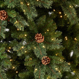 11’ White Mountain Pine Artificial Christmas Tree with 1050 Clear LED Lights, Pine Cones and 2395 Bendable Branches from Nearly Natural