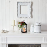 12" Holiday Berries and Greenery Metal Lantern Table Christmas Arrangement with LED Candle Included" from Nearly Natural