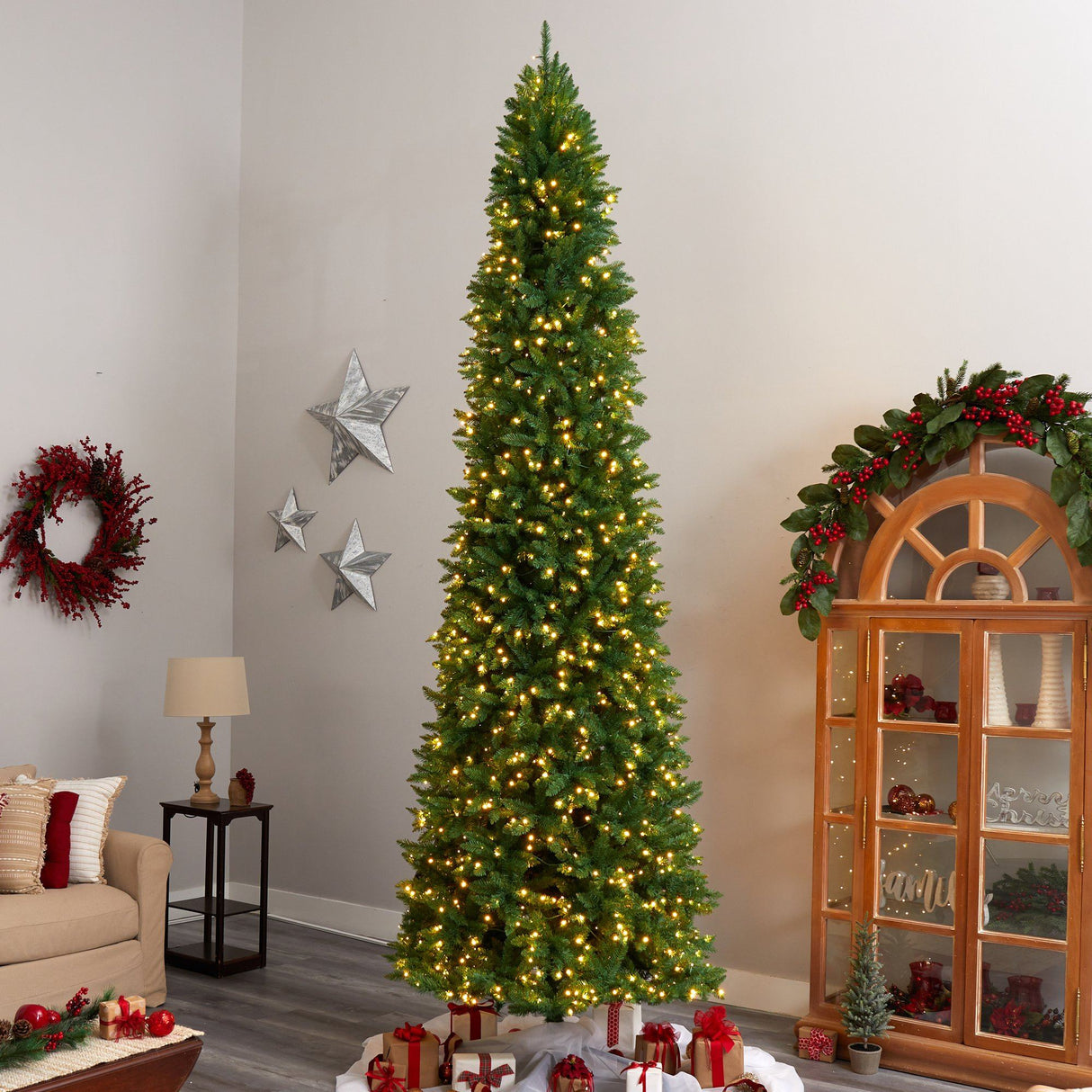 12’ Slim Green Mountain Pine Artificial Christmas Tree with 1100 Clear LED Lights and 3235 Tips from Nearly Natural