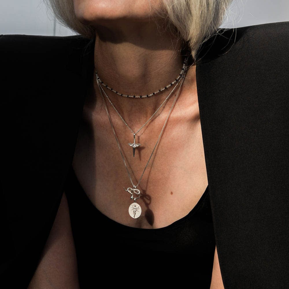 Mini Flying Dagger Necklace From Awe Inspired