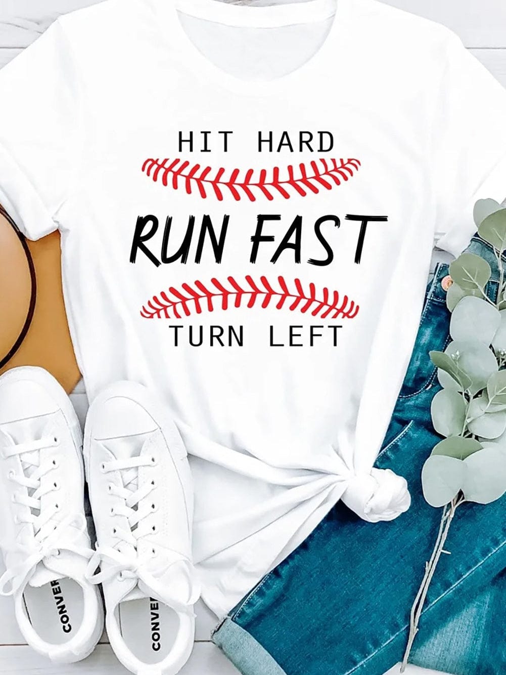 Baseball Print White Tee with "Hit Hard Run Fast Turn Left" Design from MsDressly