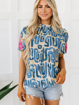 Beige Floral Embroidered Puff Sleeve Blouse with Frilled Neck from MsDressly