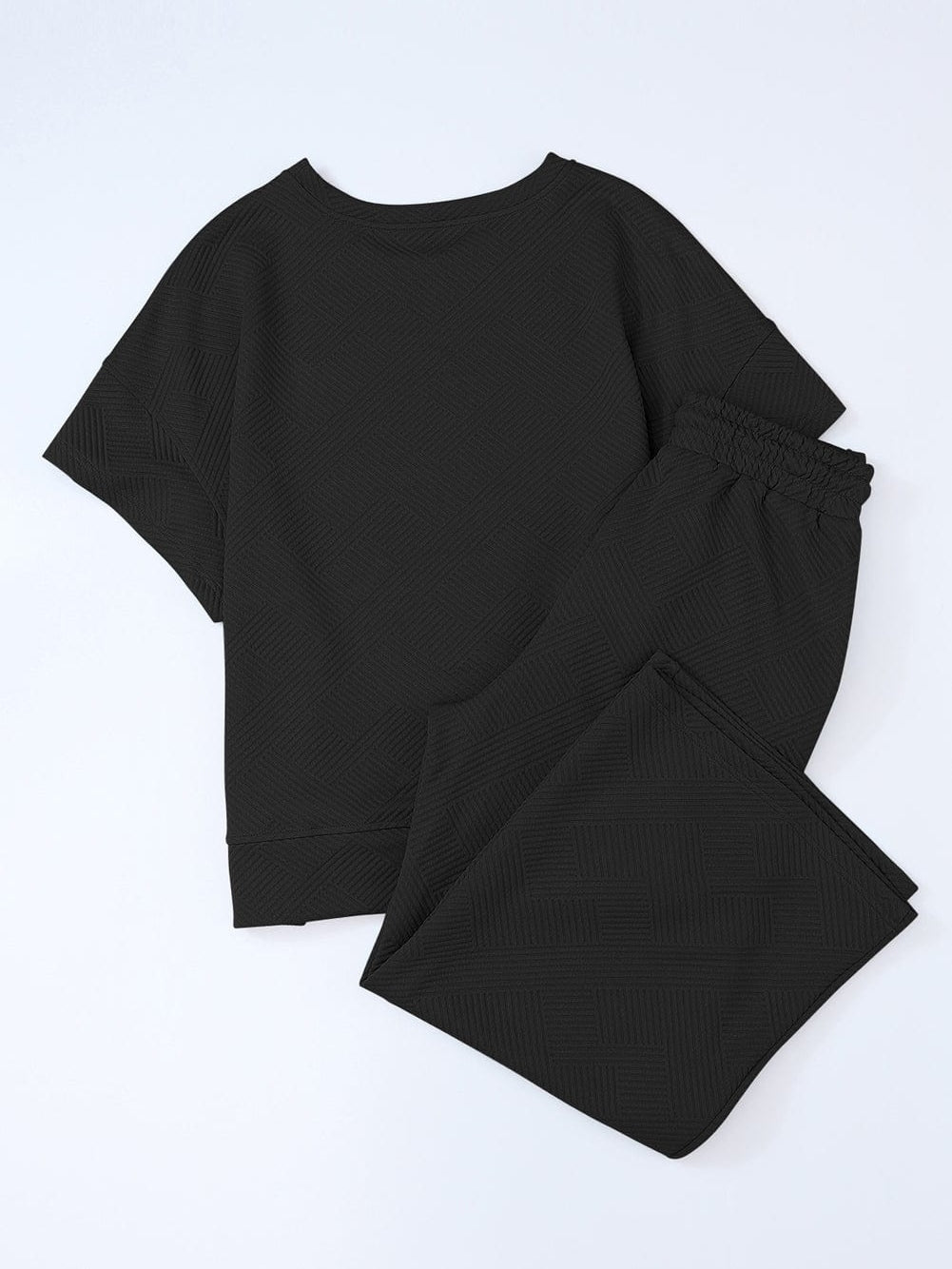 Black Ribbed Casual Lounge Set with Loose Fit Top and Drawstring Pants from MsDressly