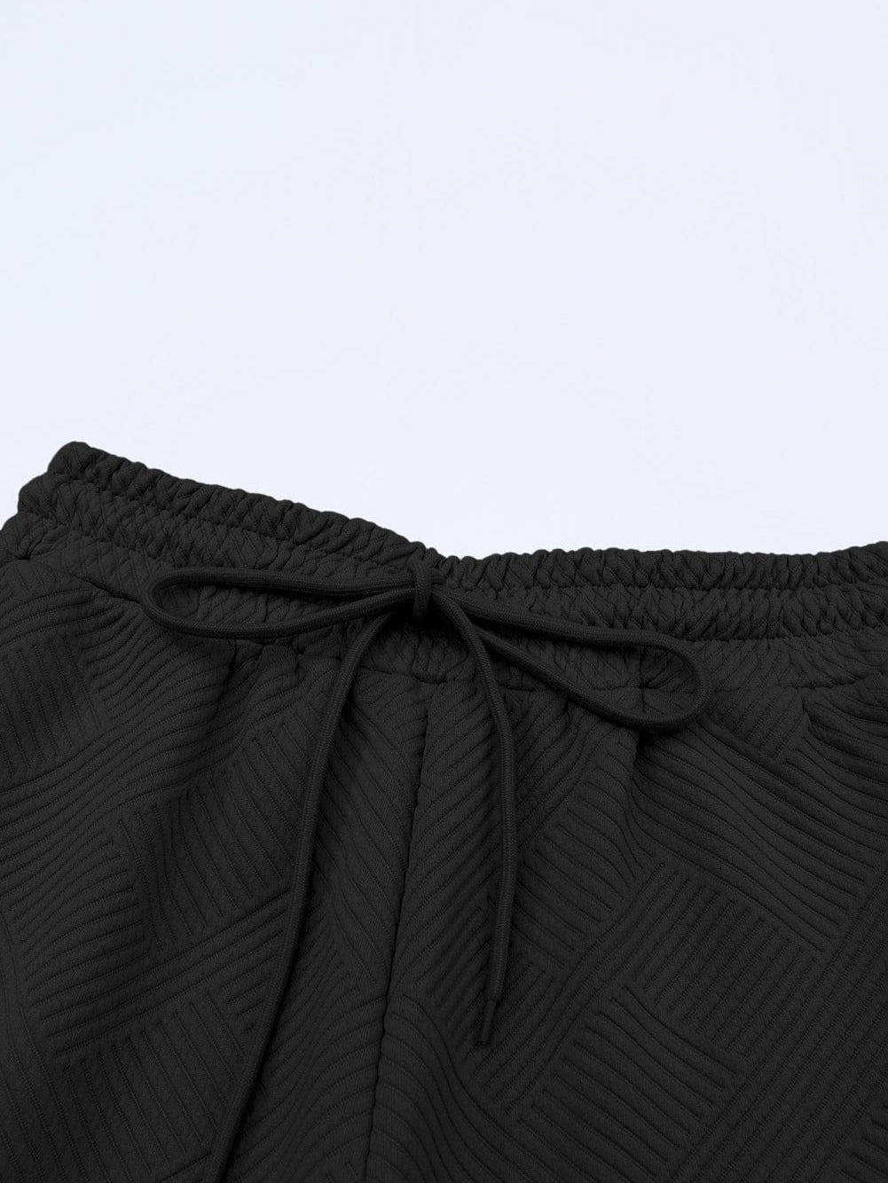 Black Ribbed Casual Lounge Set with Loose Fit Top and Drawstring Pants from MsDressly