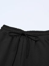 Black Ribbed Casual Lounge Set with Loose Fit Top and Drawstring Pants from MsDressly
