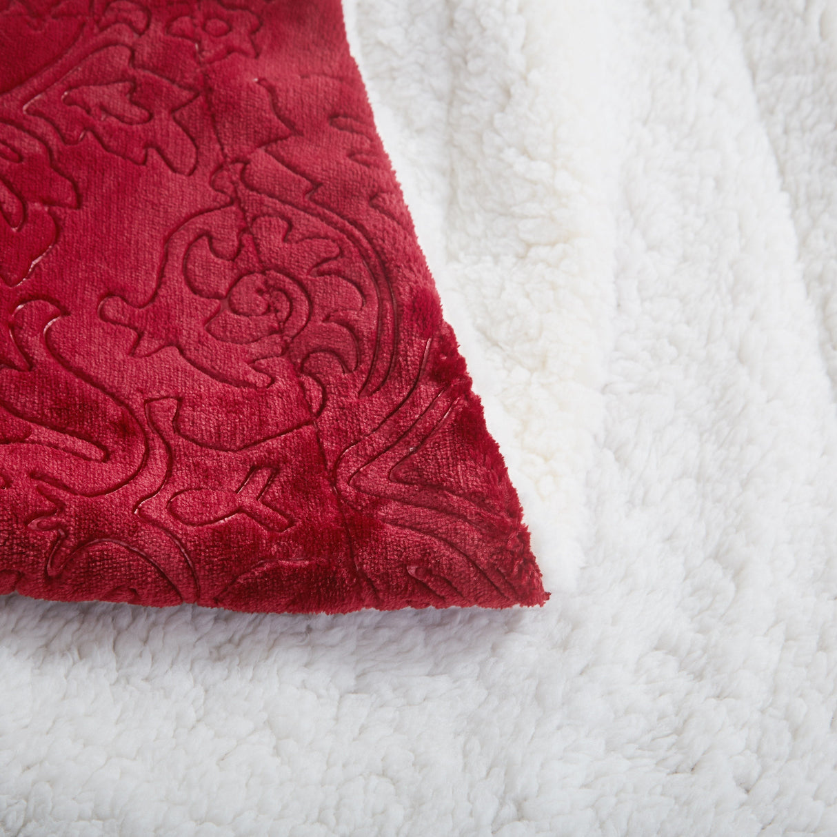 Tache Solid Embossed Merlot Red Reversible Sherpa Throw Blanket (62087) from Tache Home Fashion