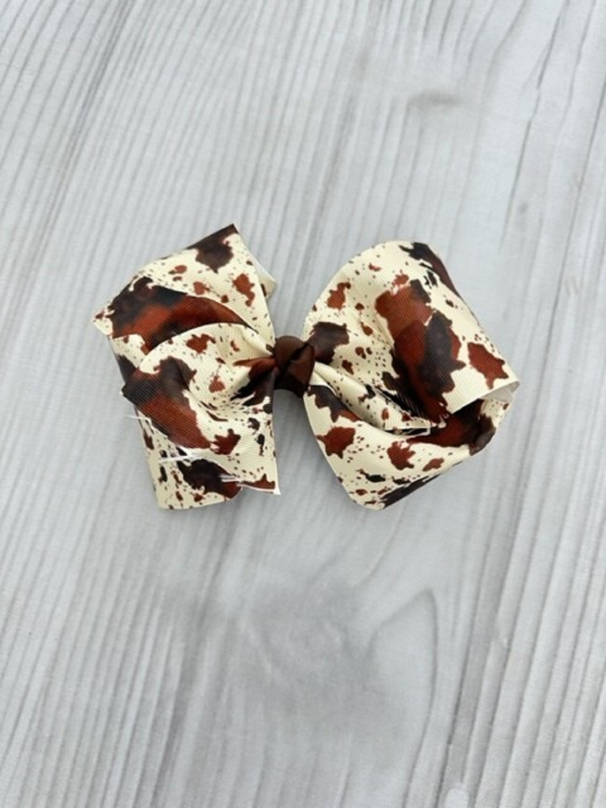 Brown and White Cow Print Bow From Toodle Treasures