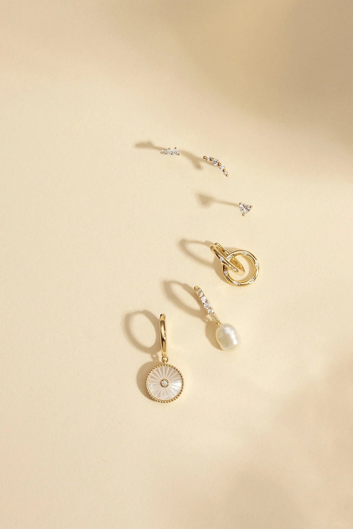 CZ Huggie Hoops With Circle Drop from eklexic