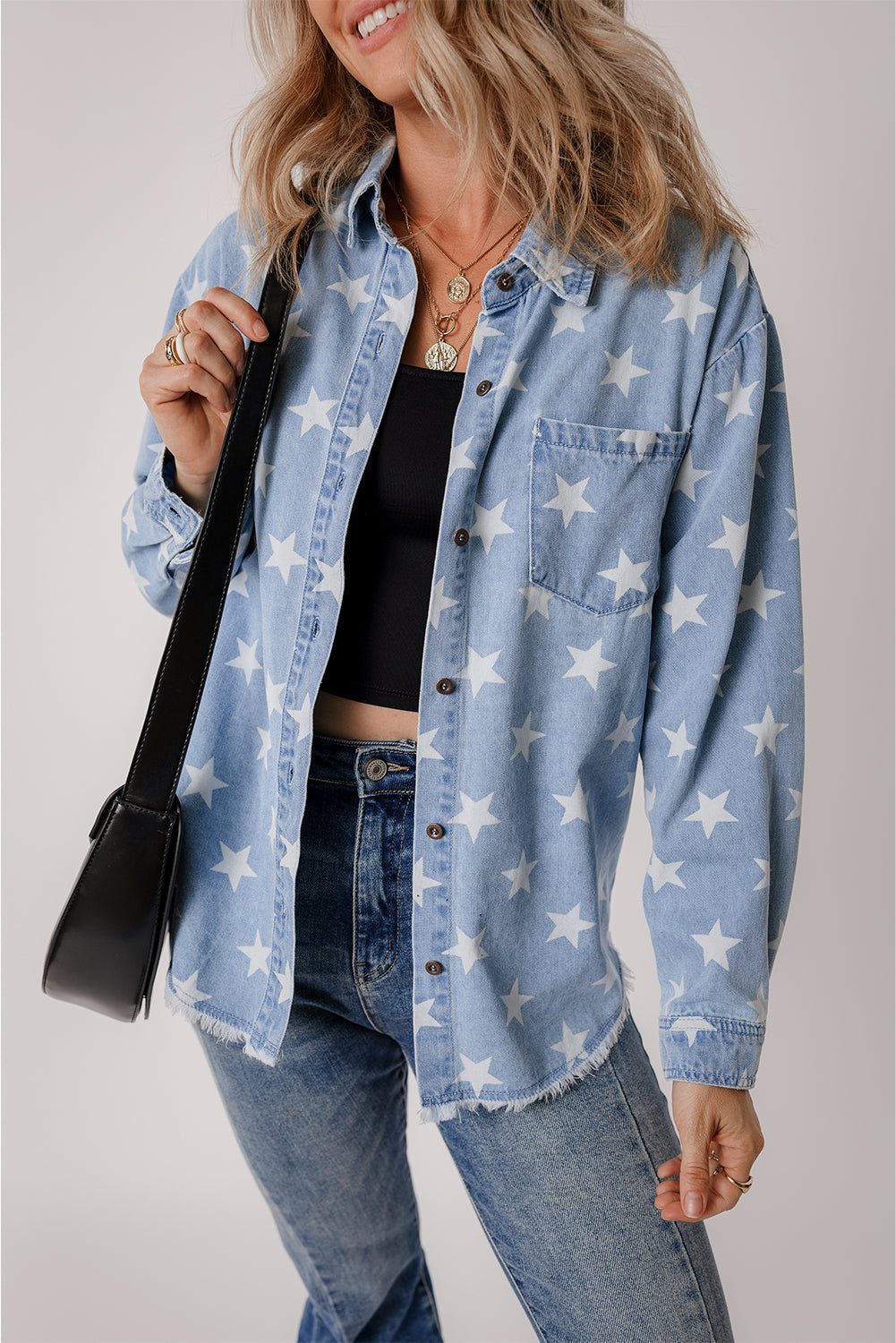 Star Light Wash Raw Hem Denim Jacket from Threaded Pear