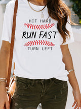 Baseball Print White Tee with "Hit Hard Run Fast Turn Left" Design from MsDressly
