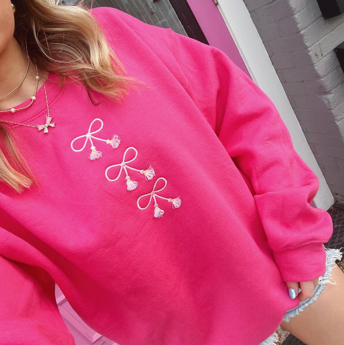 Embroidered Tasseled 'Bows' Sweatshirt from United Monograms
