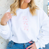 Embroidered Tasseled 'Bows' Sweatshirt from United Monograms