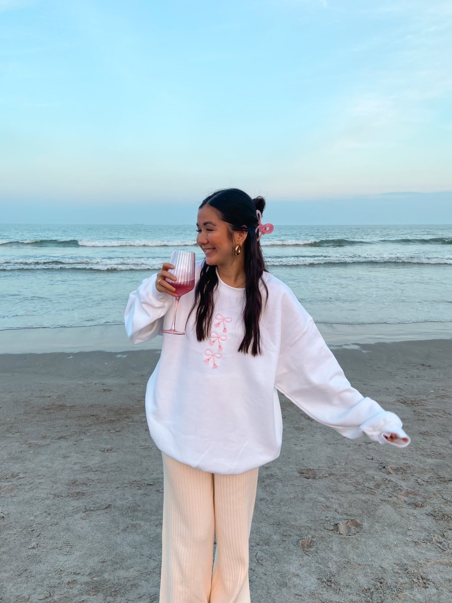 Embroidered Tasseled 'Bows' Sweatshirt from United Monograms