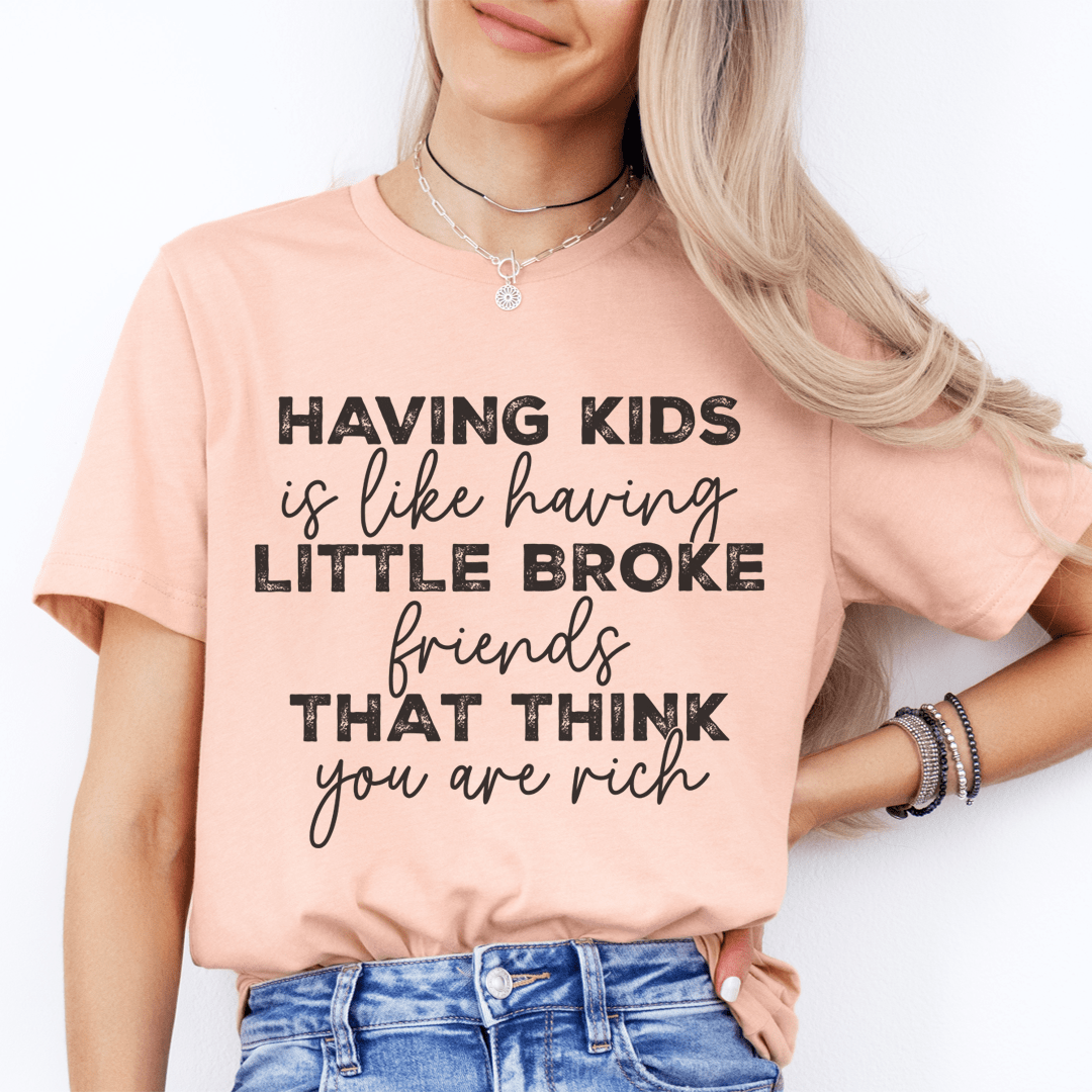 Having Kids Is Like Having Little Broke Friends Tee from Peachy Sunday
