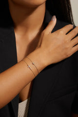 Horizontal CZ Cross Bracelet from eklexic