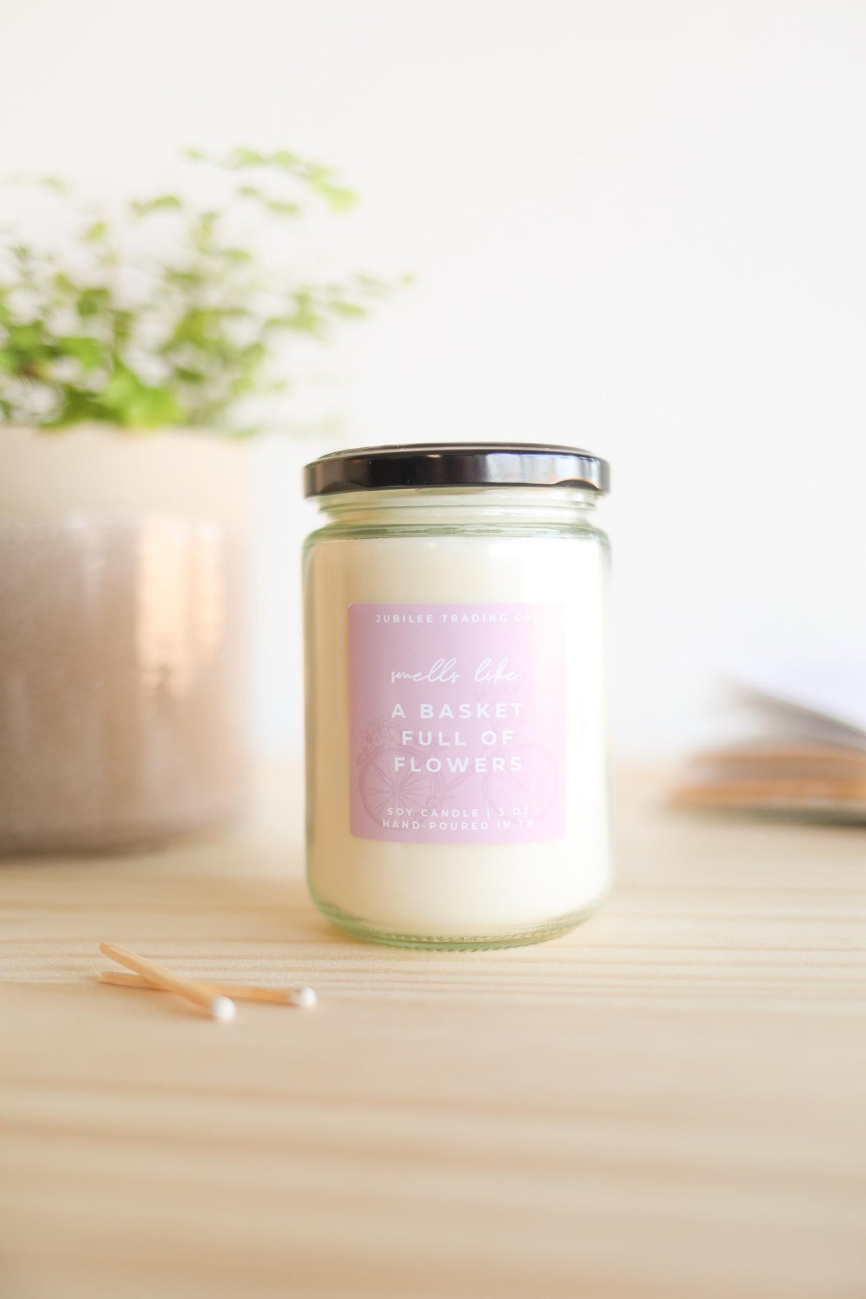 A Basket Full of Flowers Candle from Jubilee Trading Company