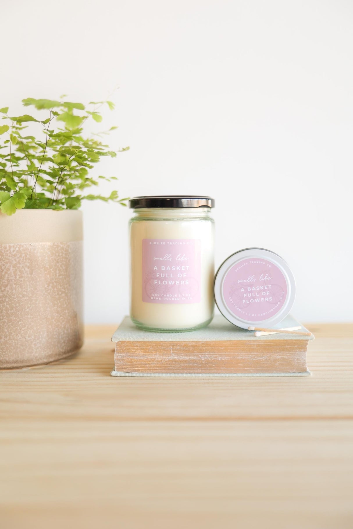 A Basket Full of Flowers Candle from Jubilee Trading Company