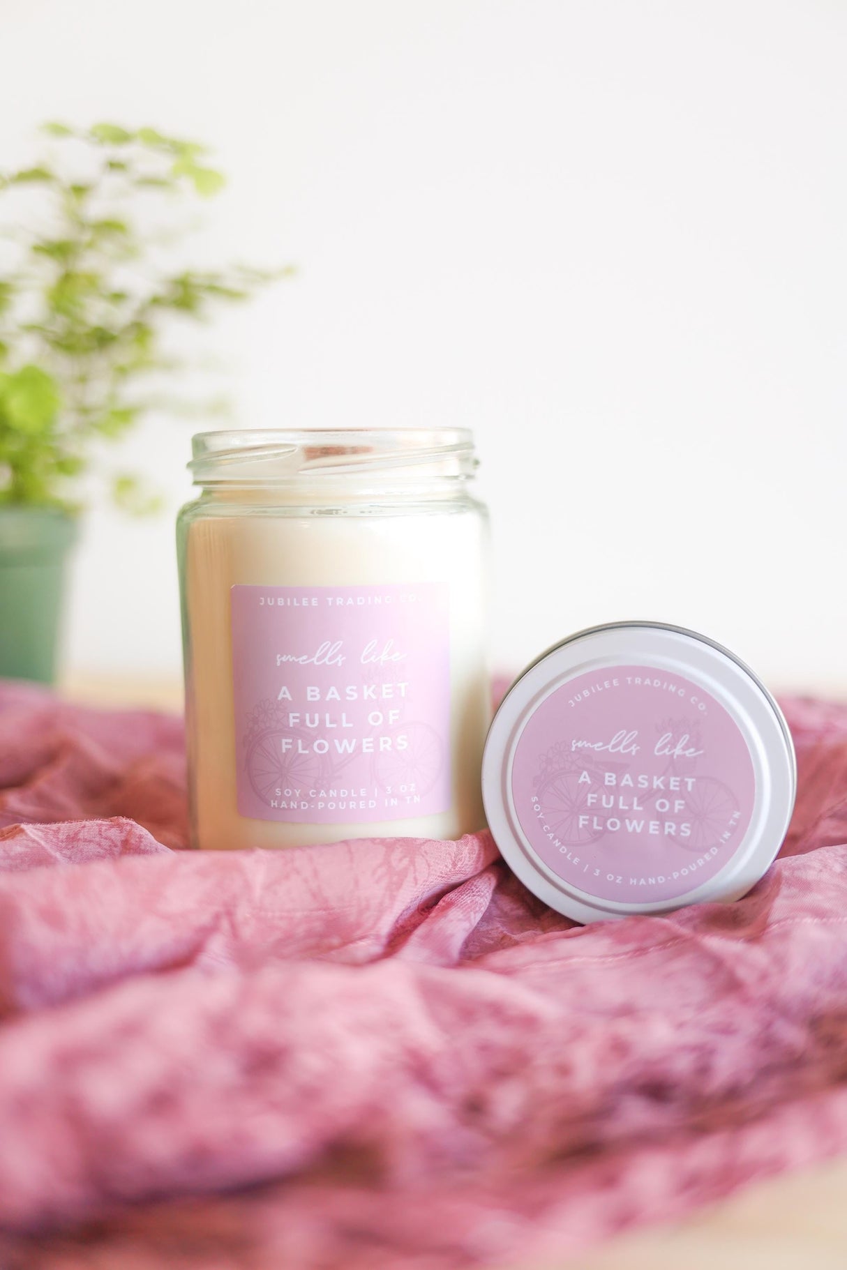 A Basket Full of Flowers Candle from Jubilee Trading Company