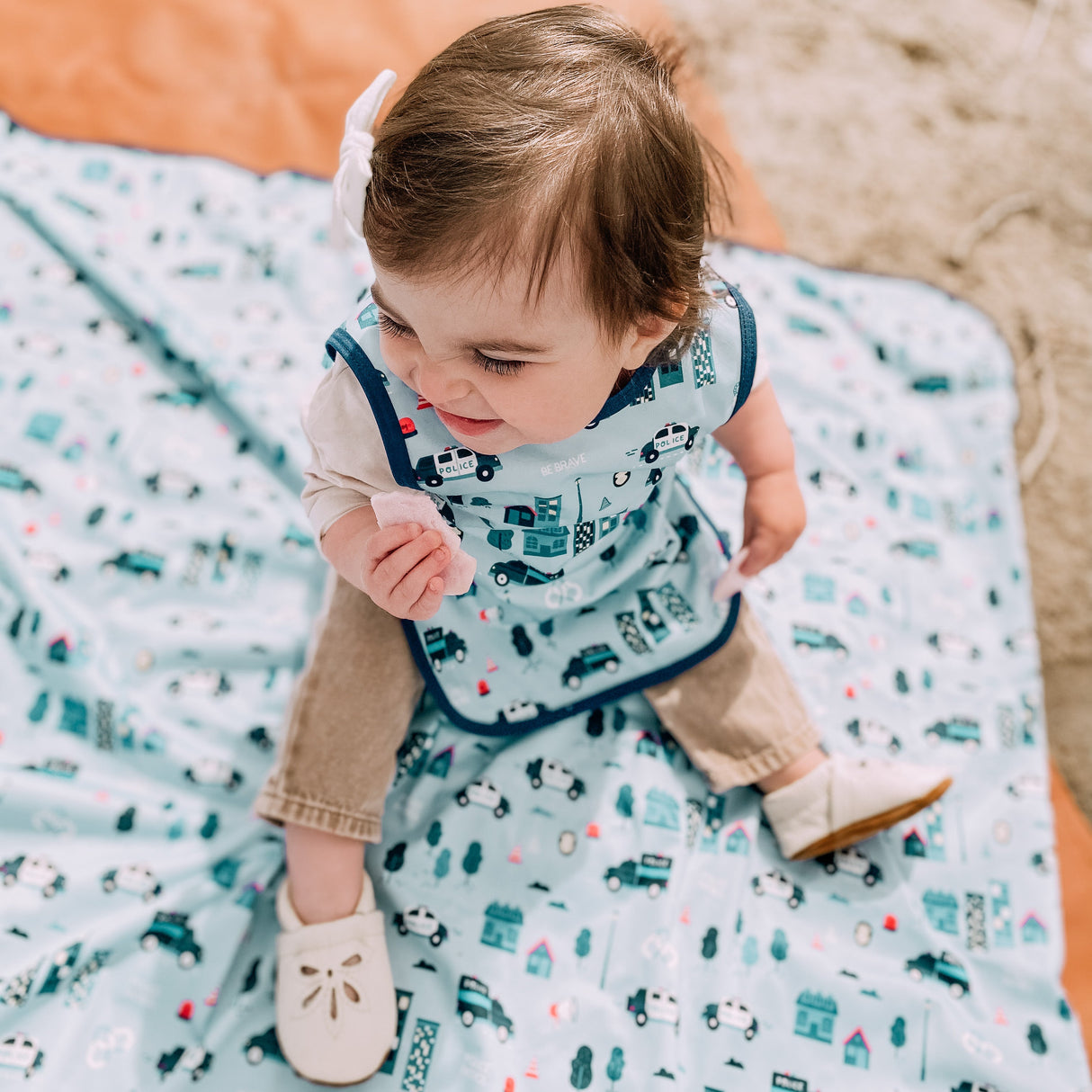 Be Brave - Police Patrol Splash Mat - A Waterproof Catch-All for Highchair Spills and More! from BapronBaby
