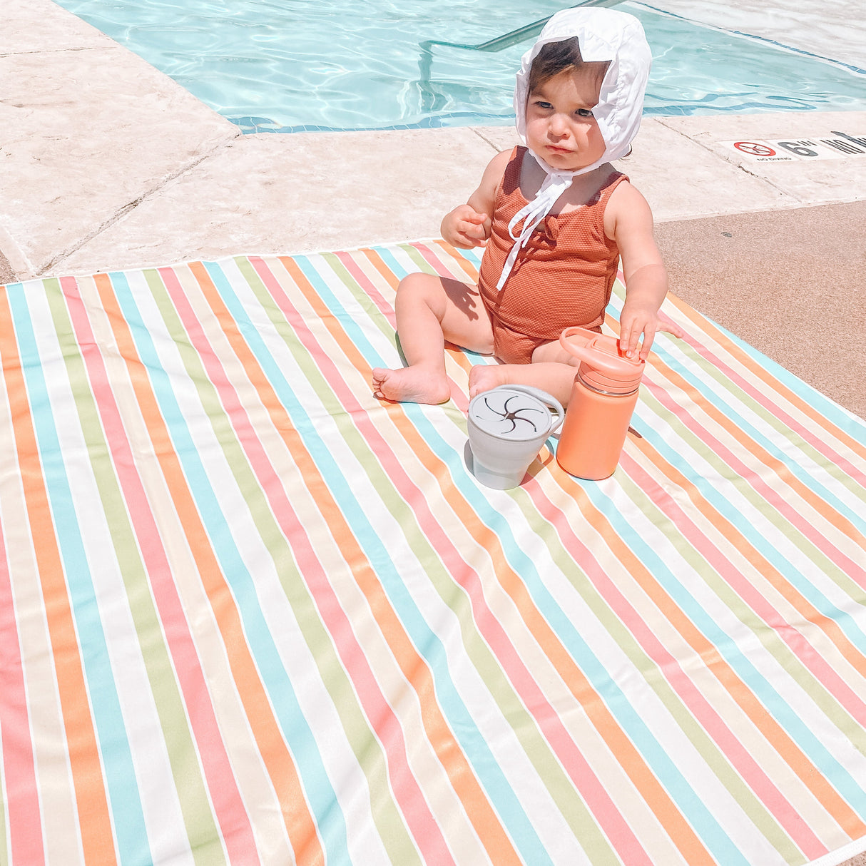 Rainbow Stripes Splash Mat - A Waterproof Catch-All for Highchair Spills and More! from BapronBaby