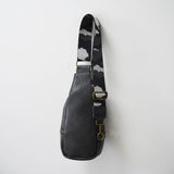 The Isla Sling Bag with Guitar Strap | Dark Gray with Camo Strap from Babs+Birdie