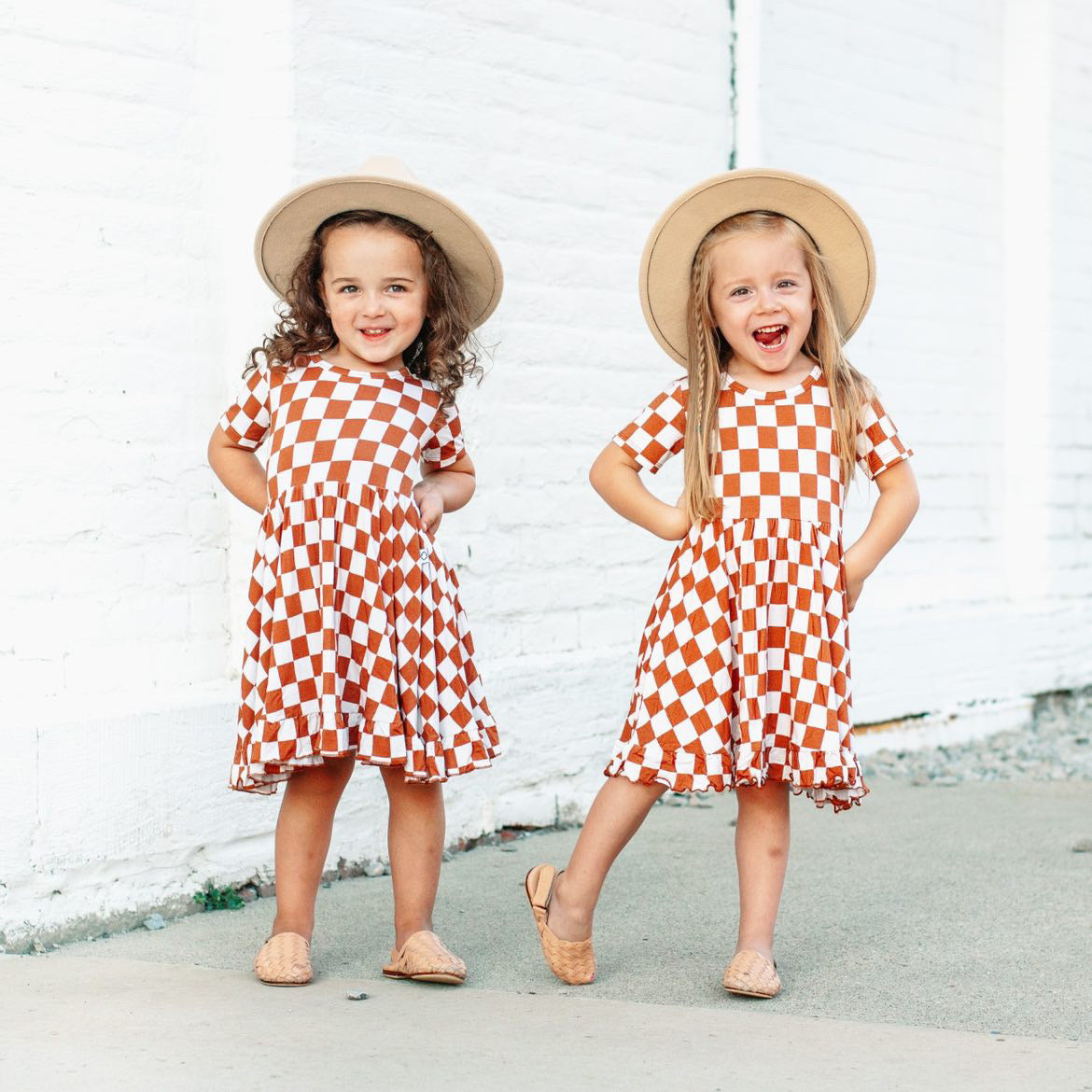 COPPER CHECKERS DREAM RUFFLE DRESS from DREAM BIG LITTLE CO