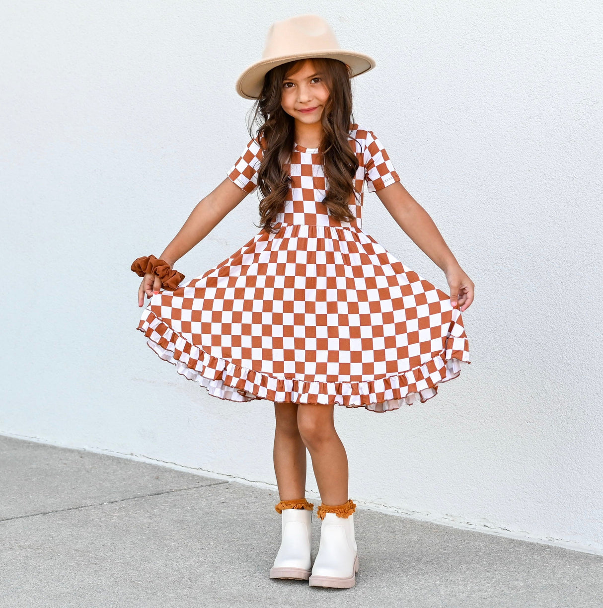COPPER CHECKERS DREAM RUFFLE DRESS from DREAM BIG LITTLE CO