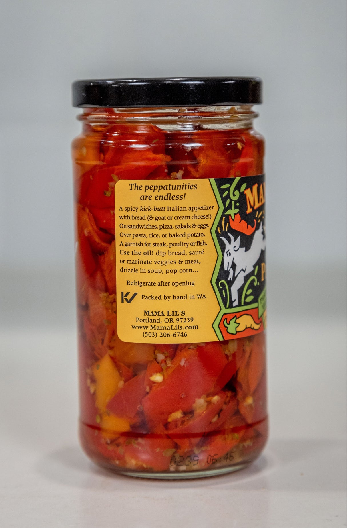 Mama Lil's Kick Butt Peppers in Oil (Spicy) - 12oz. from Mama Lil's