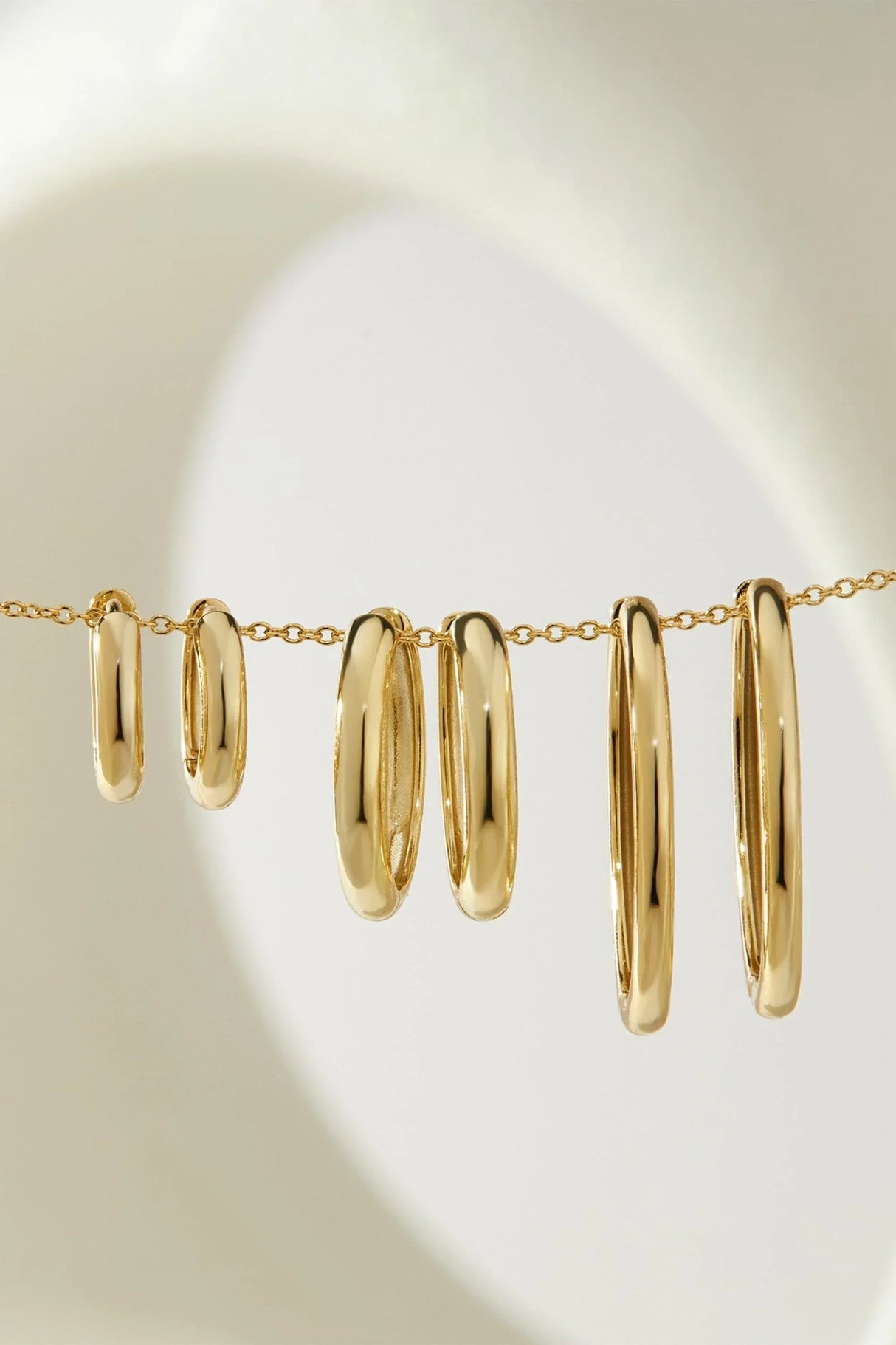Mini Huggie Hoop Earrings from eklexic