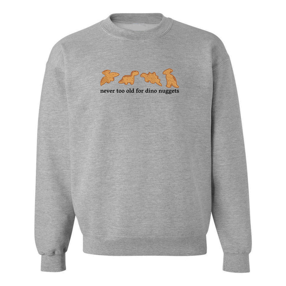 'Never Too Old For Dino Nuggets' Embroidered Crewneck Sweatshirt from United Monograms