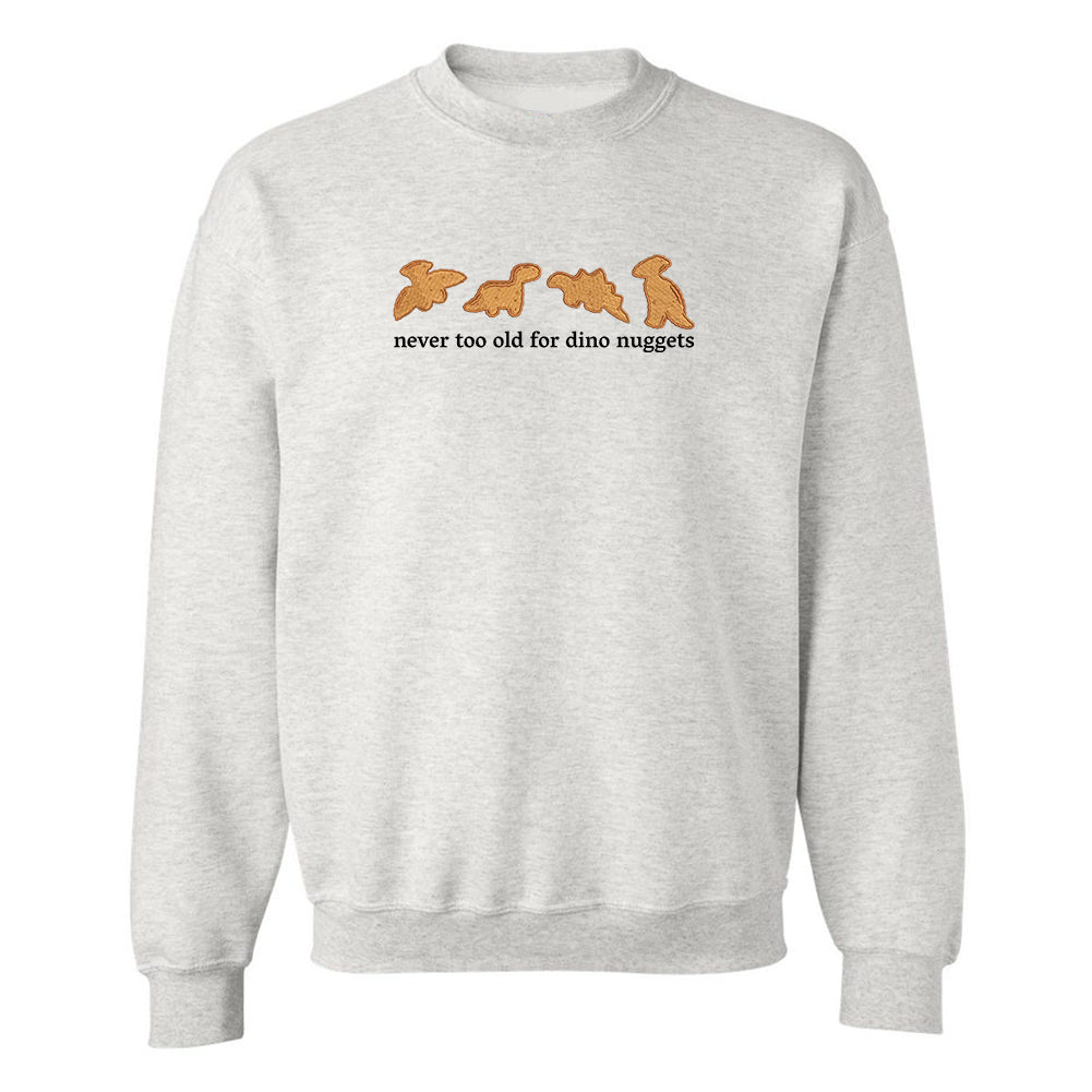 'Never Too Old For Dino Nuggets' Embroidered Crewneck Sweatshirt from United Monograms