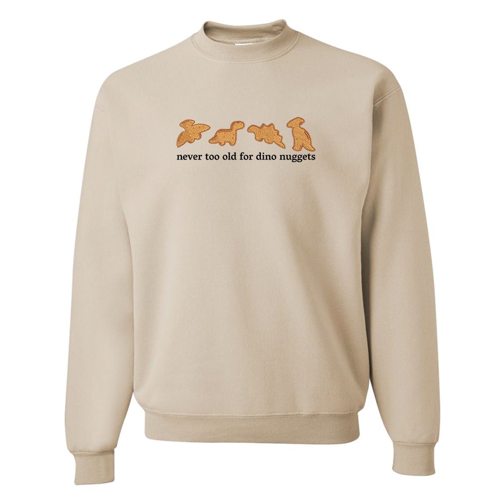 'Never Too Old For Dino Nuggets' Embroidered Crewneck Sweatshirt from United Monograms