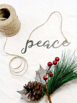 Peace Christmas Ornament From Jubilee Trading Company