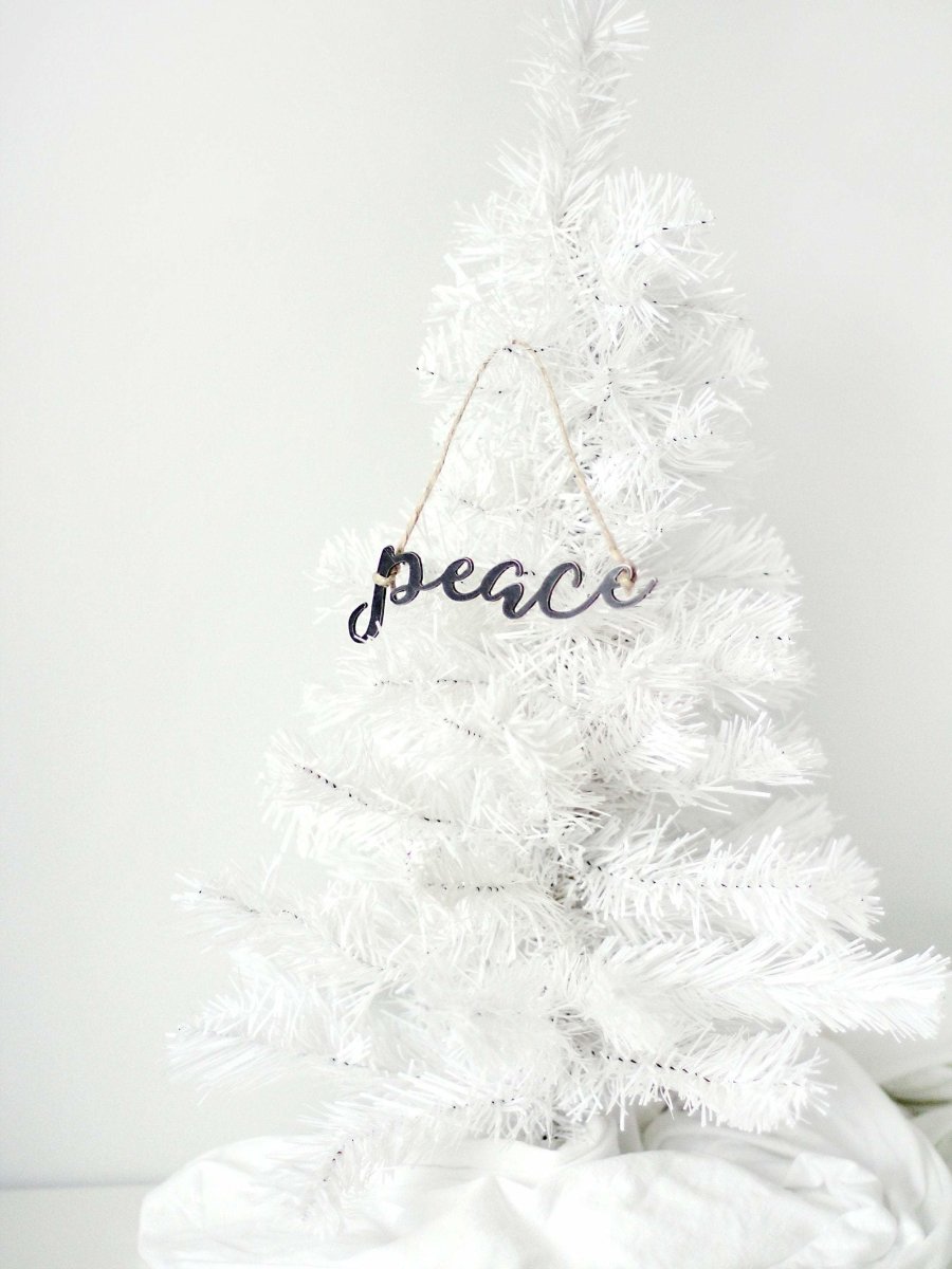 Peace Christmas Ornament From Jubilee Trading Company