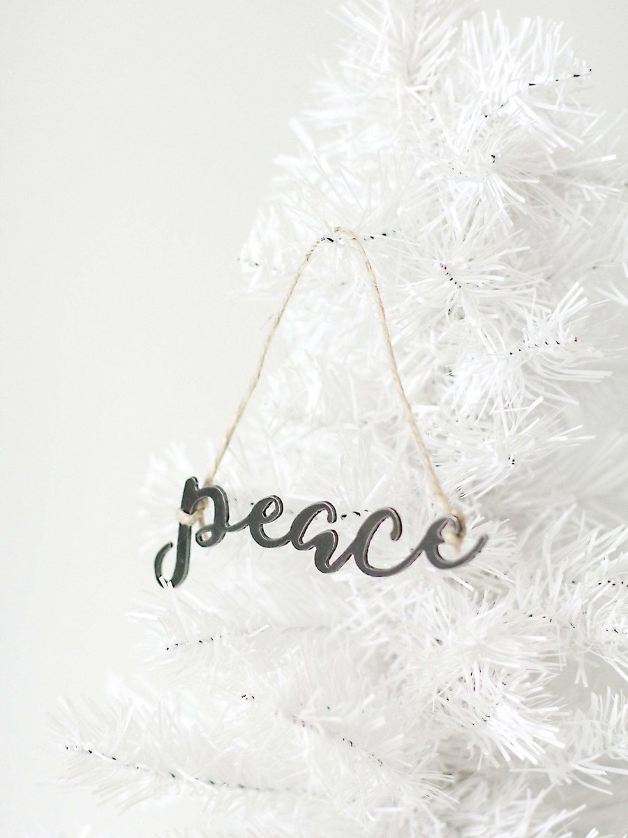 Peace Christmas Ornament From Jubilee Trading Company