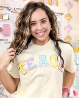 'Teach' Letter Patch T-Shirt from United Monograms