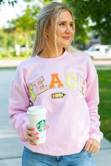 Teach Pencil Letter Patch Crewneck Sweatshirt from United Monograms