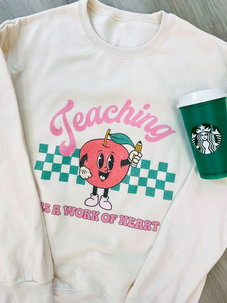 'Teaching Is A Work of Heart' Sweatshirt from United Monograms