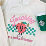 'Teaching Is A Work of Heart' Sweatshirt from United Monograms